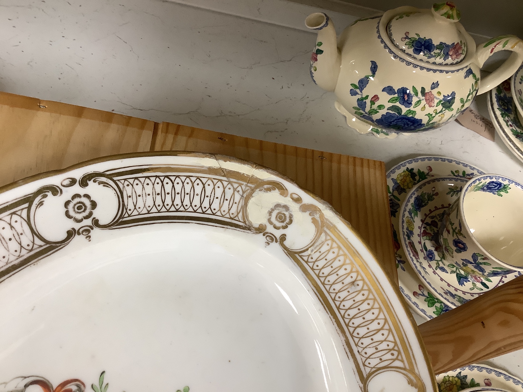 Three early 19th century Chamberlain Imari style plates after the Yeo service, two Barr Flight Barr marble ground saucer dishes and a rare Chamberlain armorial, the largest 35cm wide